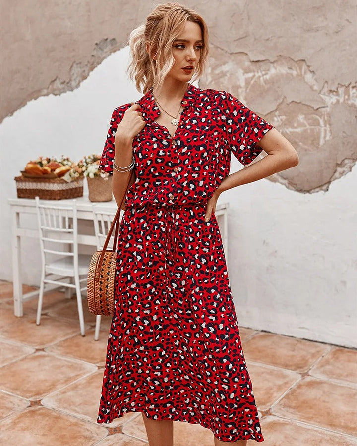 Clara - Gevlekte midi-jurk met knoopsluiting voor en verstelbare taille